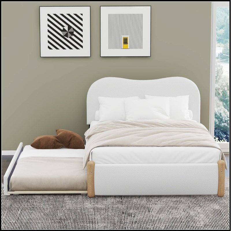 Lit plateforme tapissier avec pieds de soutien en bois et lit gigogne, durable et peu encombrant pour les chambres à coucher modernes.