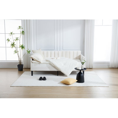 Lit de jour simple tapissier
