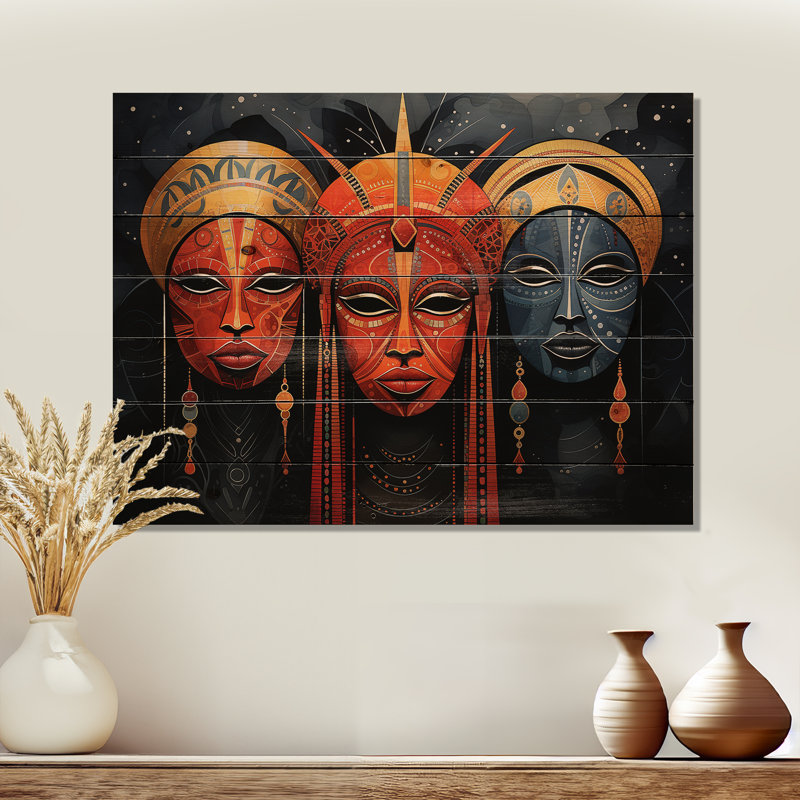 Masques rouges d'Afrique II sur bois, H 10 po x l 20 po x P 0,78 po