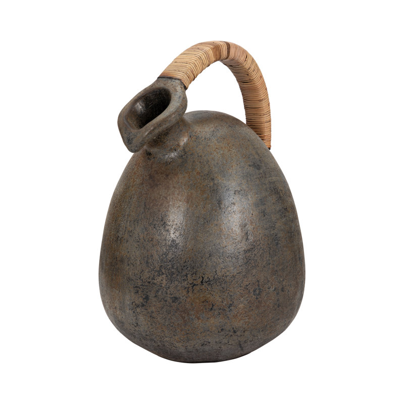 Decorative Terracotta Vase with Sculpted Form, Tilted Mouth, Matte Pottery Texture, and Woven Rattan Wrapped Handle for Textural Contrast and Handcrafted Visual Interest in Casual Home Accents
