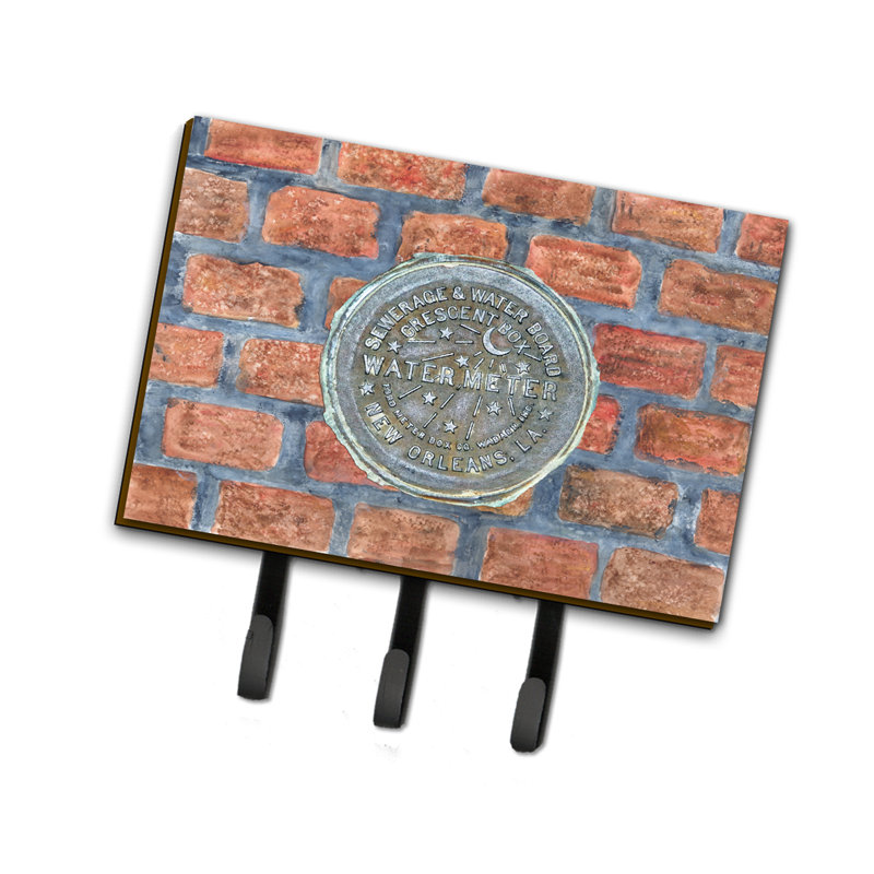 Watermeter sur la laisse de briques et le porte-clés new orléans