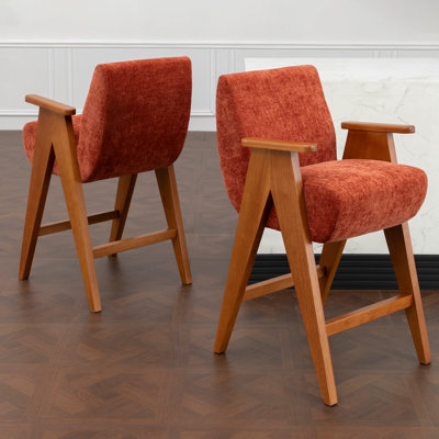 Tabouret de comptoir rembourré avec accoudoirs Kyajah