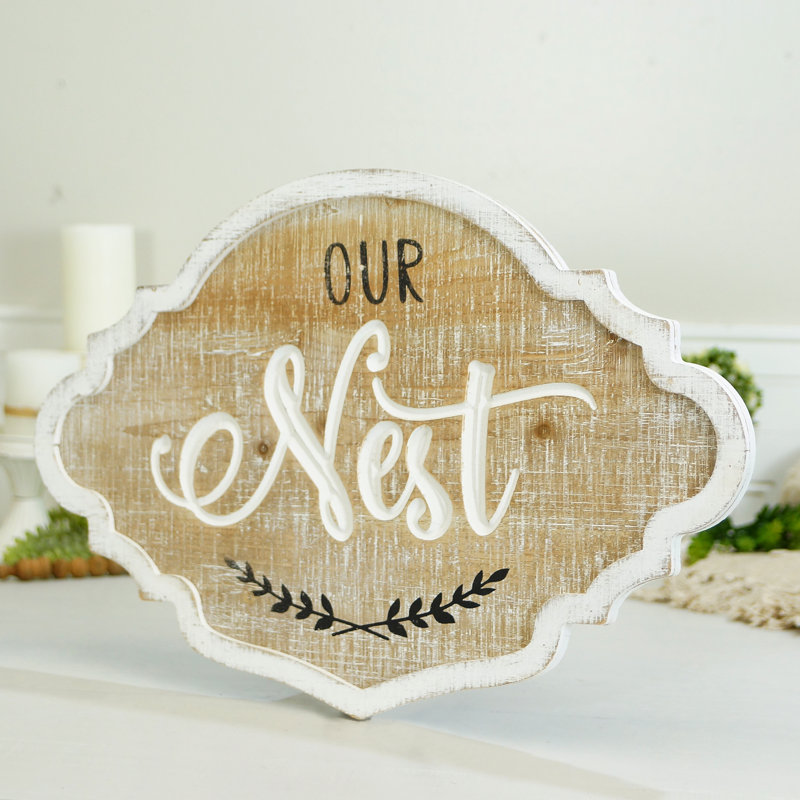 Signe en bois «NEST»