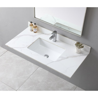 Plateau de meuble-lavabo en pierre frittée haute 43 x 22 avec lavabo rectangulaire en céramique et finition soignée
