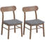 Table de salle à manger avec revêtement en lin gris et chêne foncé (100 % polyester), détails en bois massif et structure en bois d'hévéa.