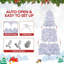 Arbre de Noël blanc illuminé-658363398