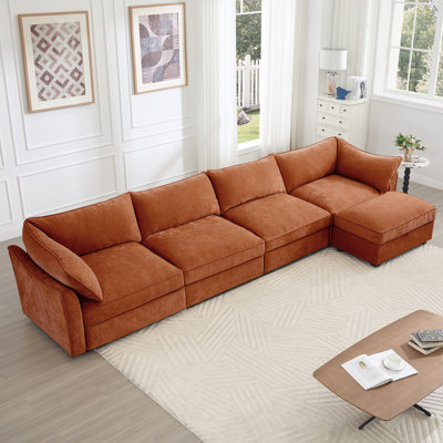 Canapé 4 places en chenille orange avec croissant, coussins enveloppants et canapé-lit escamotable en L