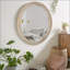 Miroir mural rond rond avec cadre en rotin tissé (23,62 po), miroir décoratif rustique moderne pour salle de bain / meuble-lavabo / salon (conception murale facile)