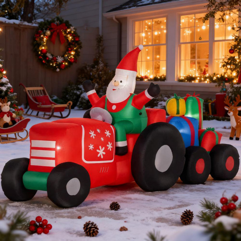 Père Noël gonflable sur remorque avec charge de cadeaux