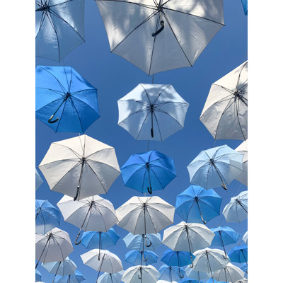 " Blue And White Umbrellas Above, Blue Sky, Vertical "