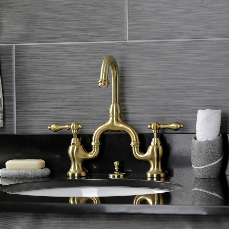 Kingston Brass English Country Two-Handle 3-Hole Deck Mount Bridge Bathroom Faucet with Brass Pop-Up, Brushed Brass