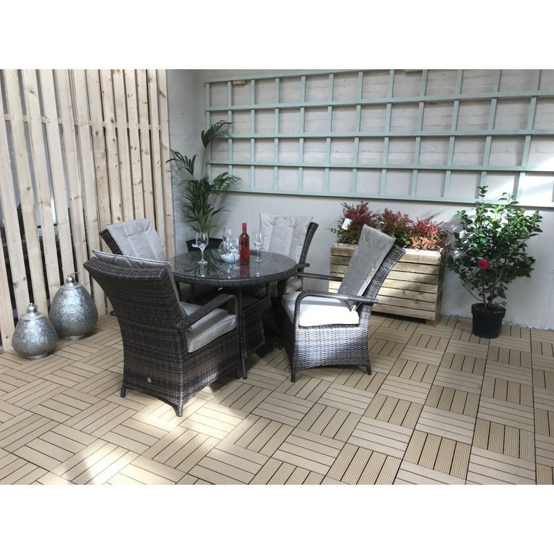 Bernelle 4 - Person Wicker Patio Dining Set with Round Table , Cushions Included