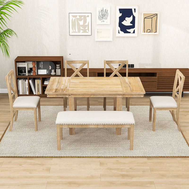 Ensemble de salle à manger de style champêtre comprenant une table extensible 6 pièces avec 2 rallonges amovibles, 4 chaises rembourrées et un banc.