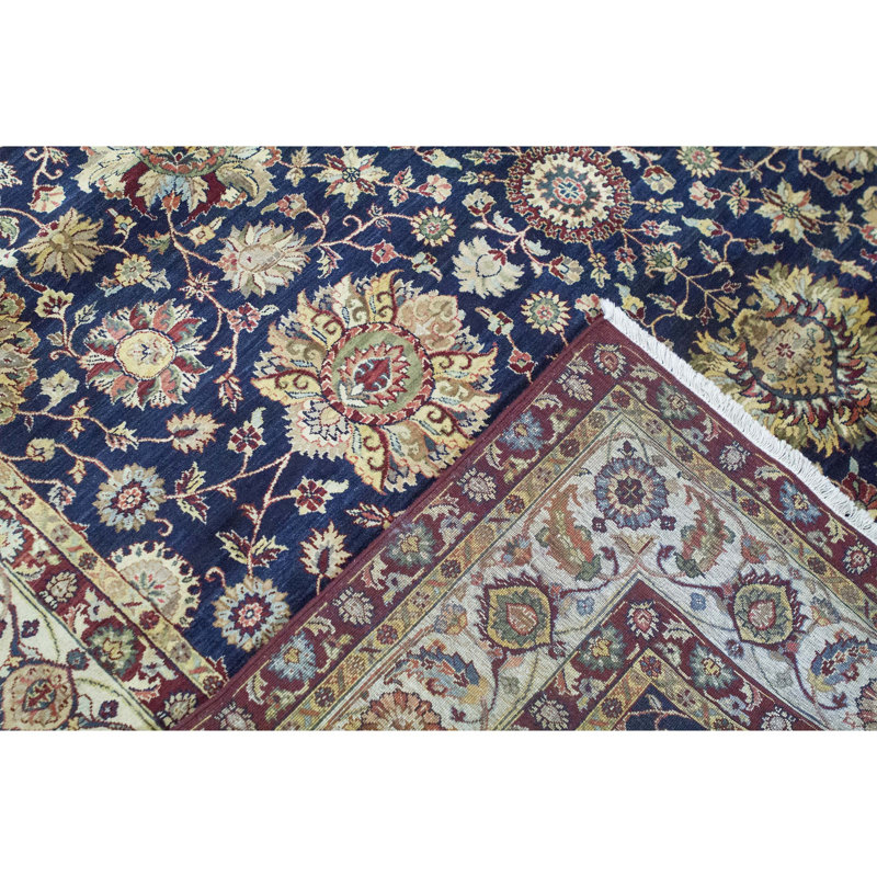 Tapis rond bleu et crème de haute qualité noué à la main