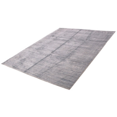 Tapis bleu clair unique 9 pi 1 po x 12 pi 1 po Marystone