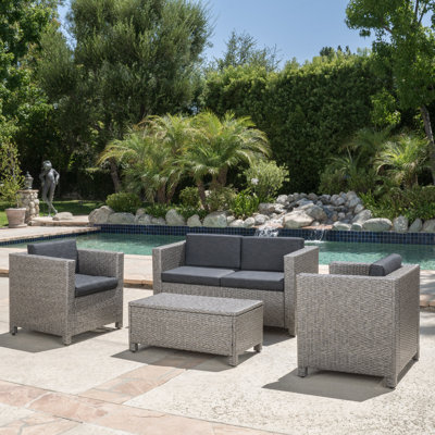 Arville 4 Piece Rattan Sofa Seating Group with Cushions by Wade Logan