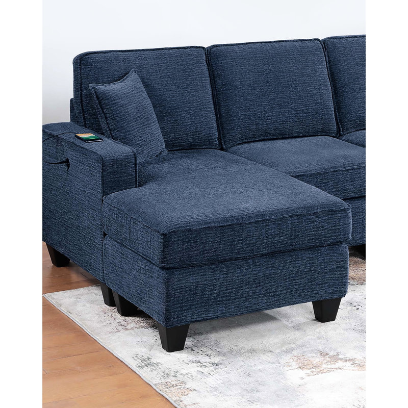 Canapé d'angle bleu foncé 3 places en chenille avec méridiennes à droite et à gauche, sans accoudoirs, idéal pour un confort optimal dans votre salon.