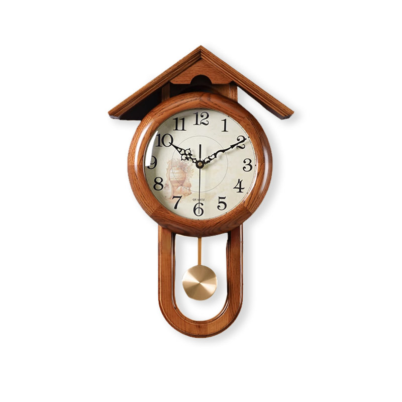 Vintage solid wood wall clock with a roof-shaped top and a metal pendulum