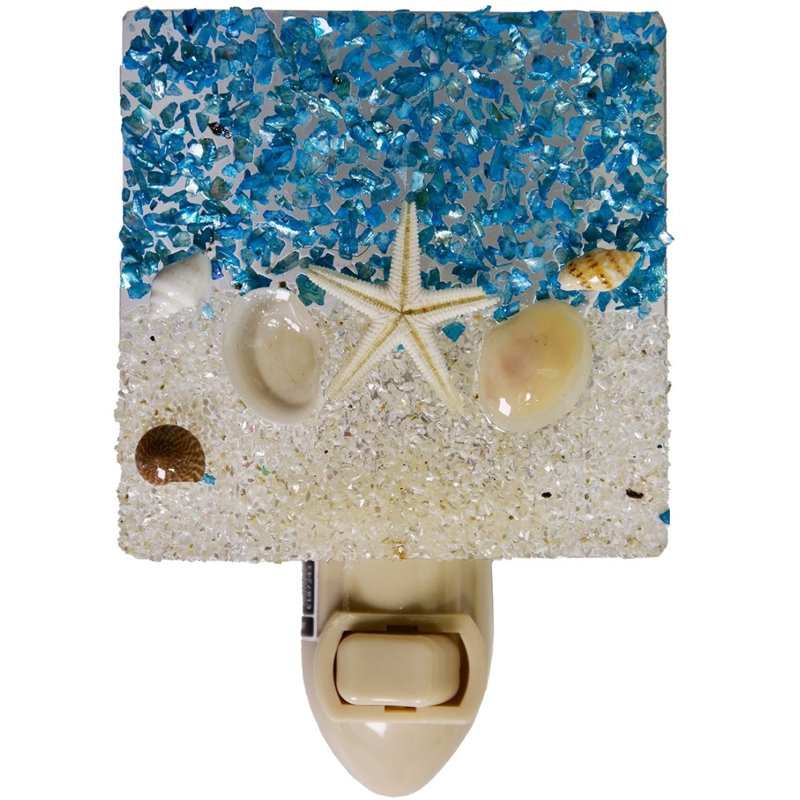 Sable et mer avec veilleuse DEL étoile de mer