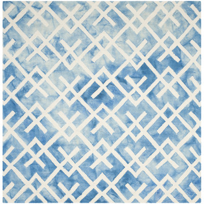 Bryauna Hand Tufted Wool/Cotton Geometric Rug in Blue/Ivory