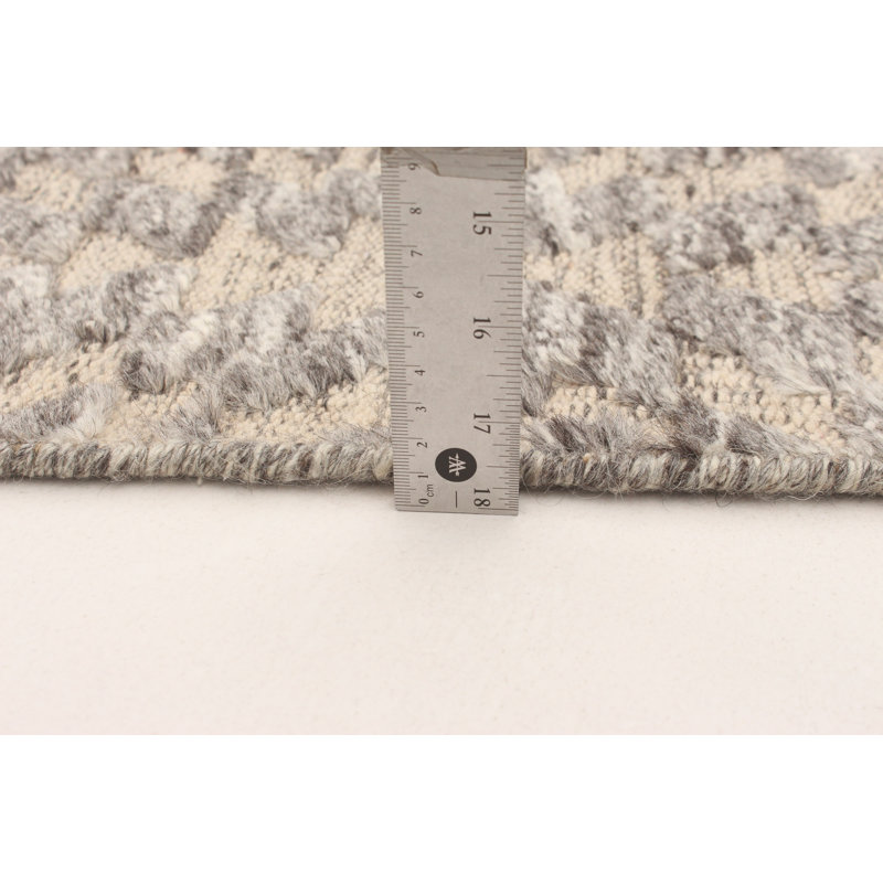 Tapis gris foncé en laine noué à la main