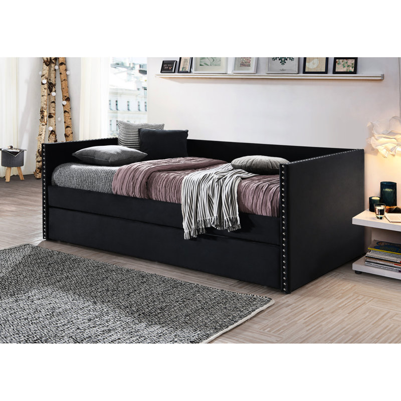 Lit de jour à finition noire avec garniture cloutée et lit gigogne escamotable pour chambre à coucher contemporaine chic au design exquis