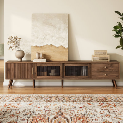 Meuble télé pour téléviseurs de 70 à 85 po, console de 76 po avec portes coulissantes en verre à forme d'ondes, tiroirs profonds et chambre à coucher de salon de haute qualité, texture rayée, charnières de tiroir à fermeture douce