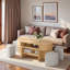 Table basse multifonctionnelle ovale avec rangement caché à lattes, compartiment de rangement ouvert et 4 tabourets courbés rembourrés