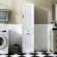 Armoire à linge blanche avec rangement pratique pour les vêtements souillés et les petits objets