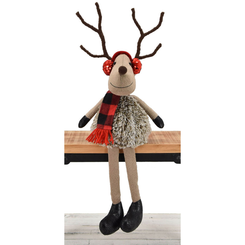 Cerf assis avec cache-oreilles à paillettes