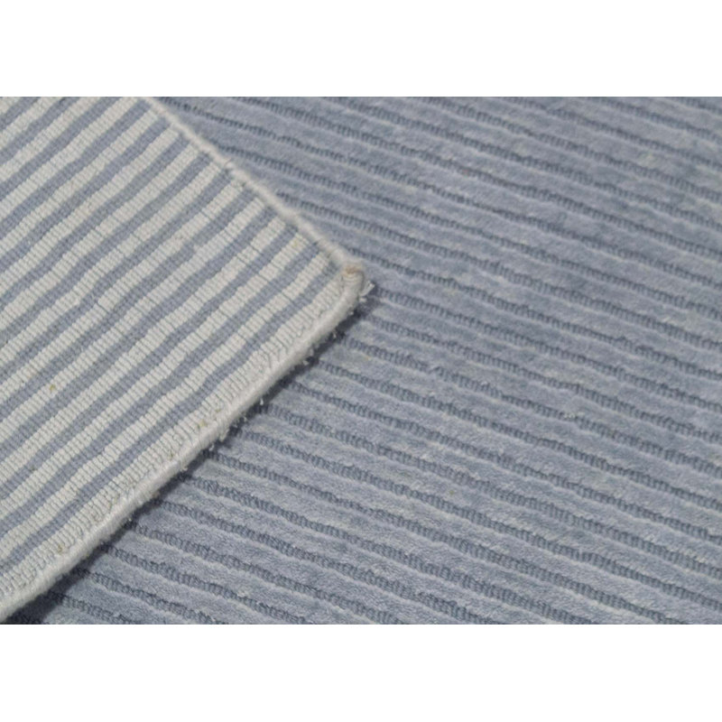 Tapis bleu clair noué à la main de haute qualité