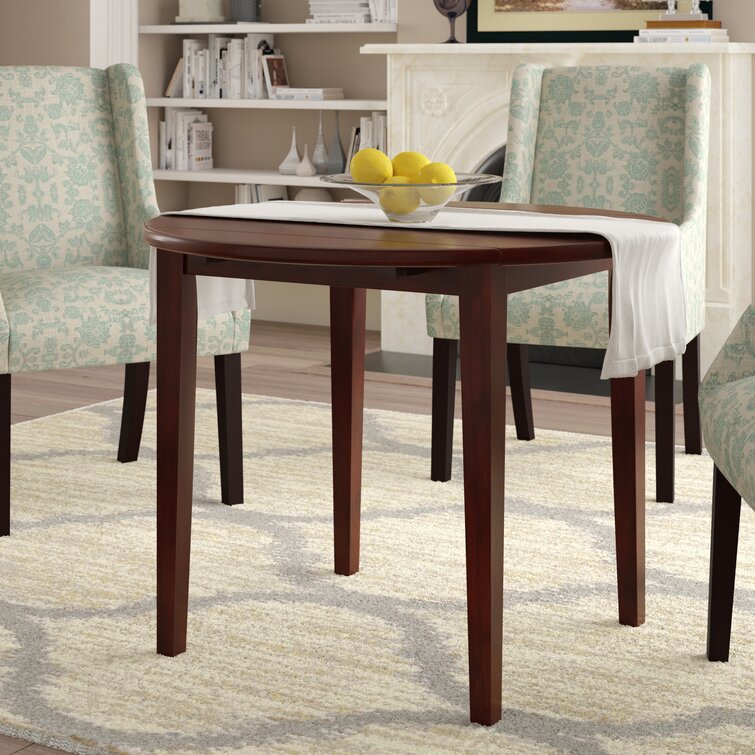 Apolino Extendable Round Solid Wood Dining Table