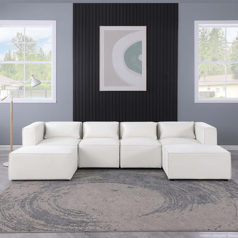 Canapé beige en chenille à accoudoirs carrés