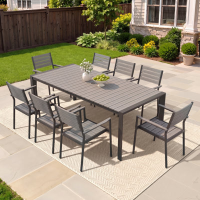 8 - Person 84’’ L Rectangular Aluminum Dining Set with Stacking Chairs