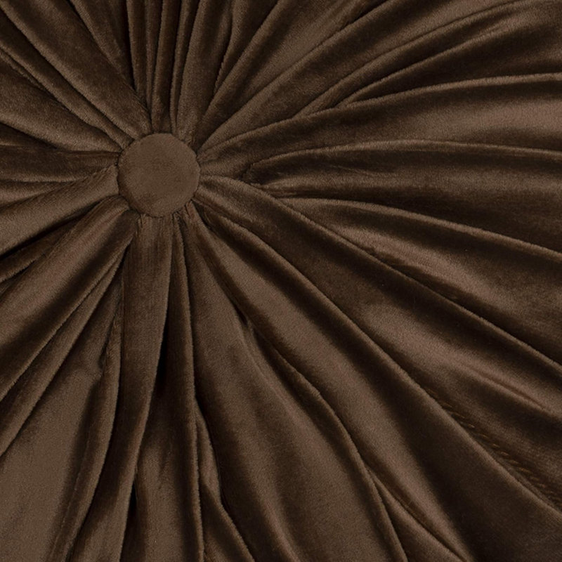 Coussin rond en velours touffeté brun