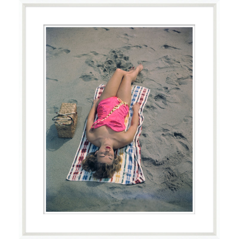 Pat Hall Lying On Beach Giclee Print by Getty Images, 39" H x 33" W x 2.75" D, Brown