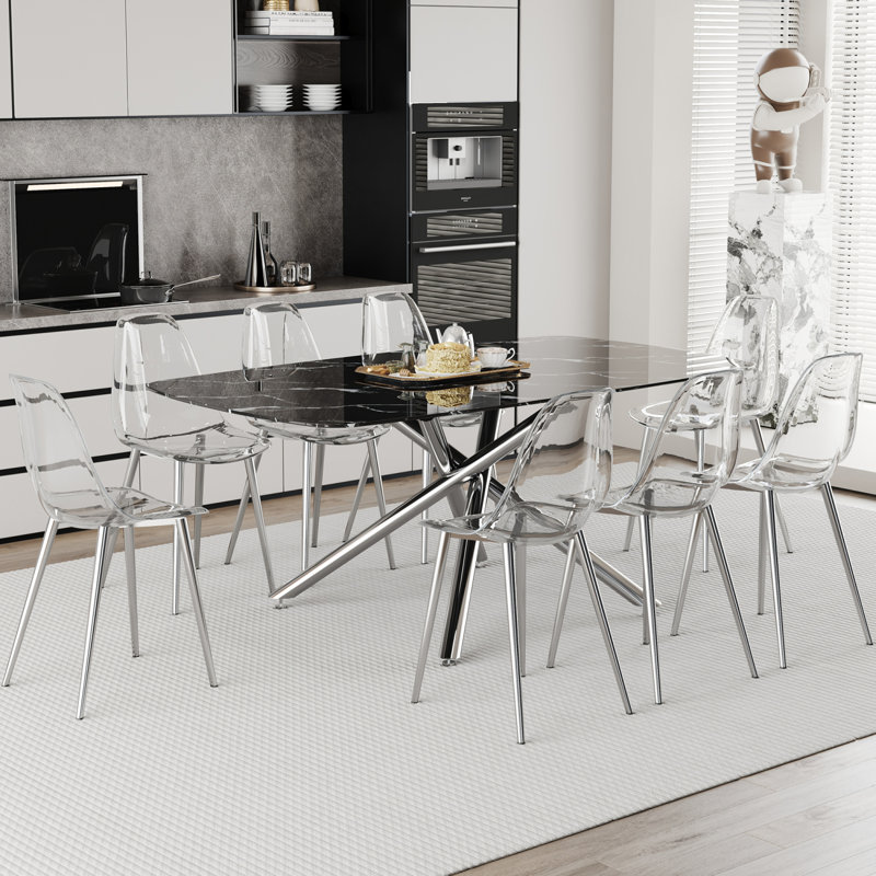 Ensemble de table et de chaises. Ensemble de table de salle à manger moderne luxueux en verre trempé à motif de marbre avec 8 chaises en plastique transparent. Plusieurs chaises de salle à manger en PP de haute qualité transparentes avec pieds argentés.