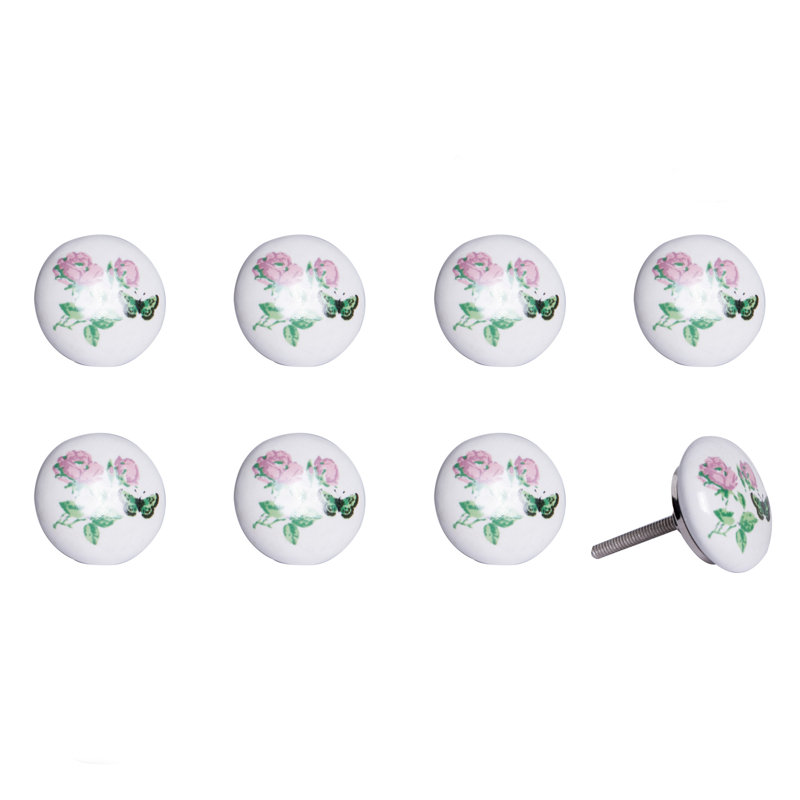 Ensemble de huit boutons de tiroir floraux en céramique et métal rose clair et blancs