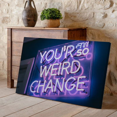 Canvas A Close Up View Of A Vibrant Neon Sign Displaying Wall Art The Phrase You Re So Weird Don T Change Glowing Perfect For Stylish Canvas Wall Art