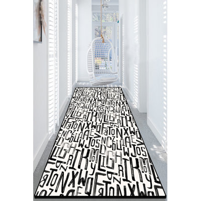Tapis blanc / noir en polyester tissé à plat à la main Dzimitry