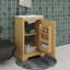 Meuble-lavabo de 20 pouces avec lavabo, une porte, un support de rangement et une tablette réglable