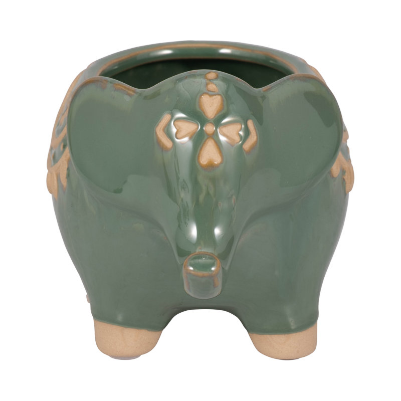 Pot de fleurs en grès avec des détails en relief et un design en forme de mouton