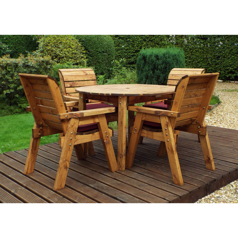 Feliciano 4 - Person Wood Patio Dining Set with Round Table , Cushions Included, Grey