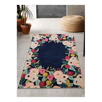 Tapis multicolore bleu marine à motif floral rose