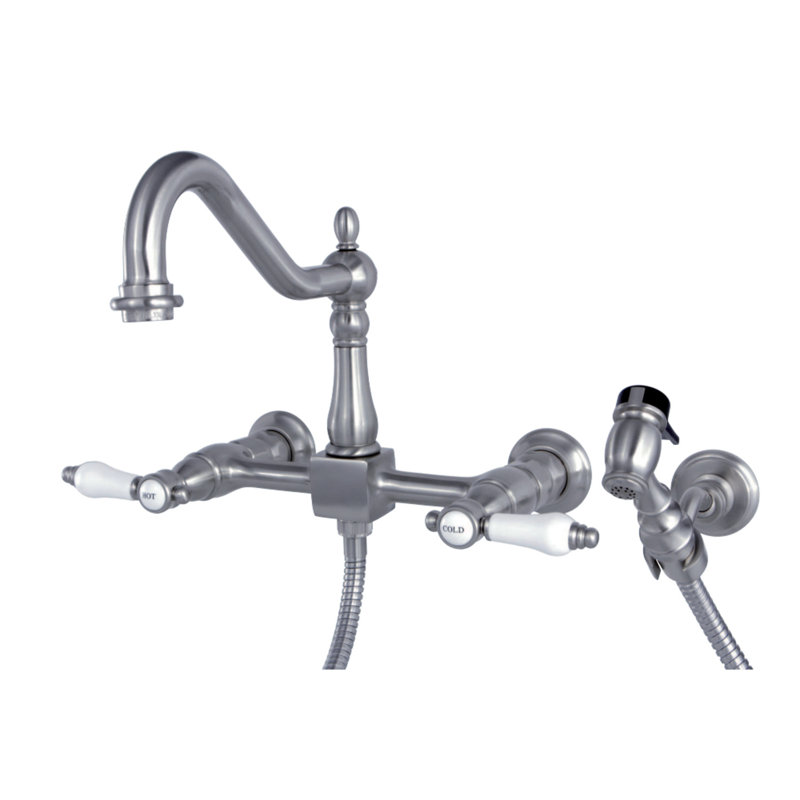 Kingston Brass Essex Double-Handle Wall-Mount Bridge Kitchen Faucet, Brushed Nickel, With Side Spray, Porcelain Lever 