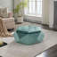 Repose-pieds en velours de rangement élégant-118486640
