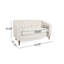 Canapé contemporain en tissu beige, capitonné, pour le confort de la maison