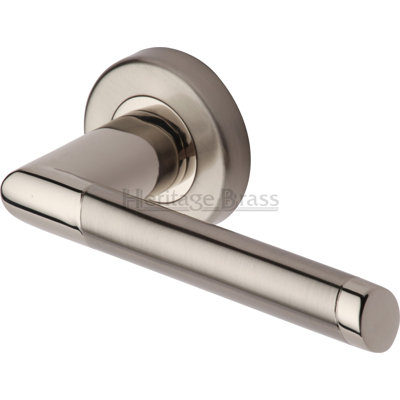Heritage Brass Door Handle Lever Latch on Round Rose Ellipse Design