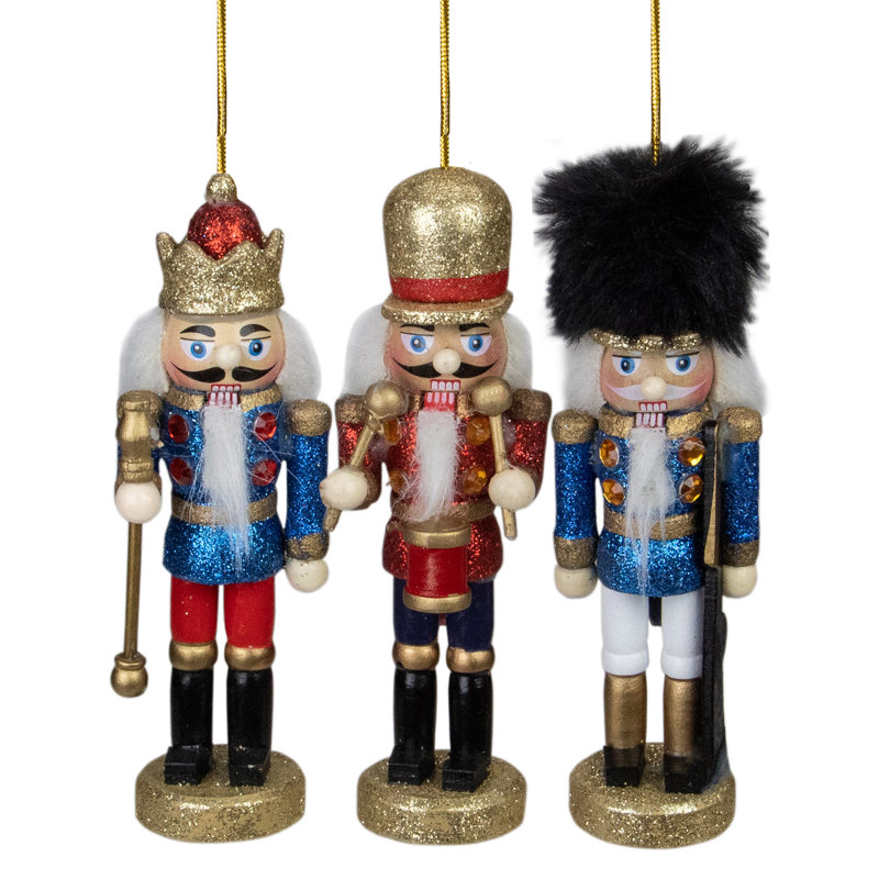 Ornements brillants de casse-noisette et de tambour