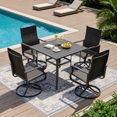 Ensemble de salle à manger de patio pour 4 personnes avec fauteuils pivotants à 360 ° et table en métal